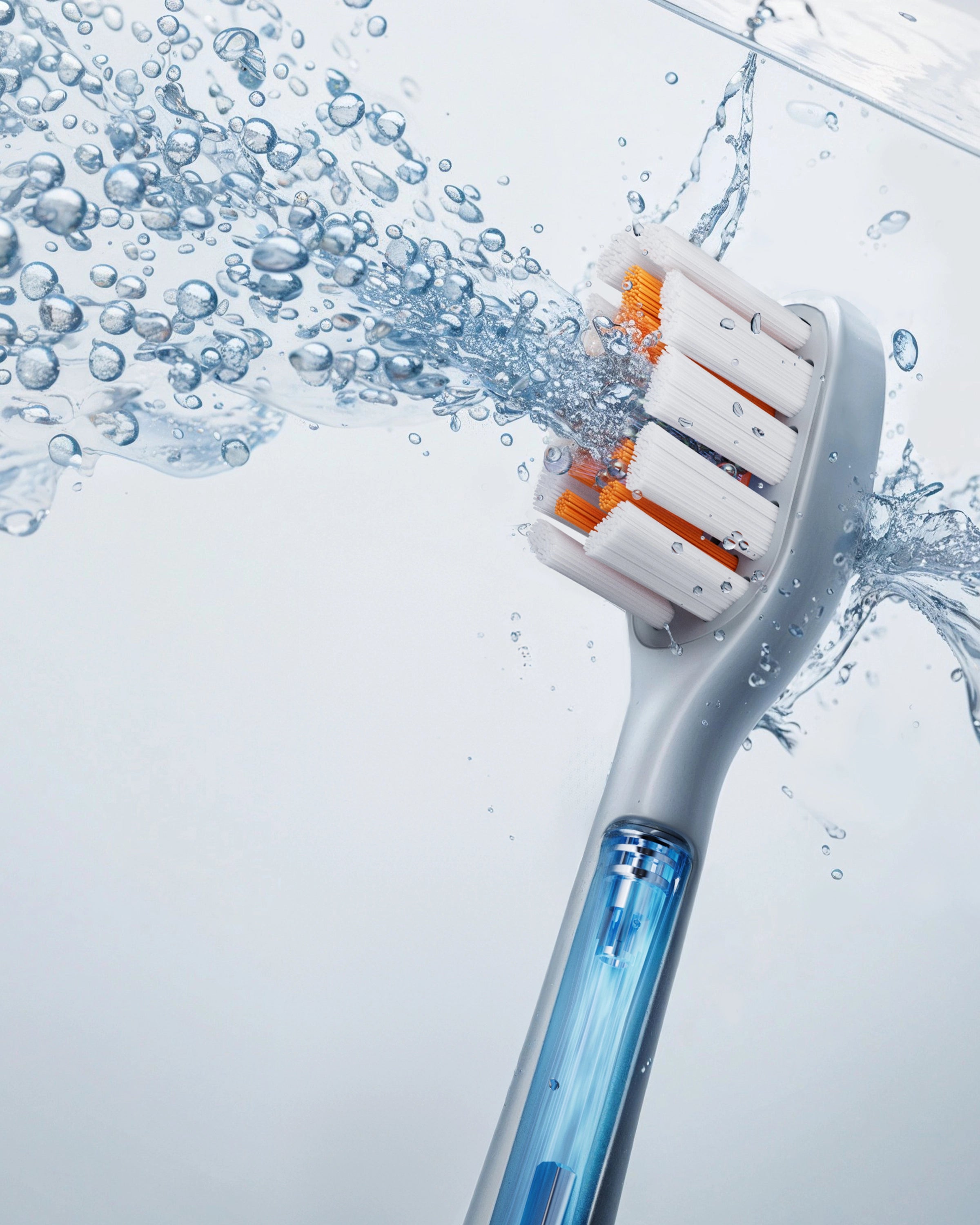 AirJet X3 Conadǎ brush head with water and bubble blowing out.