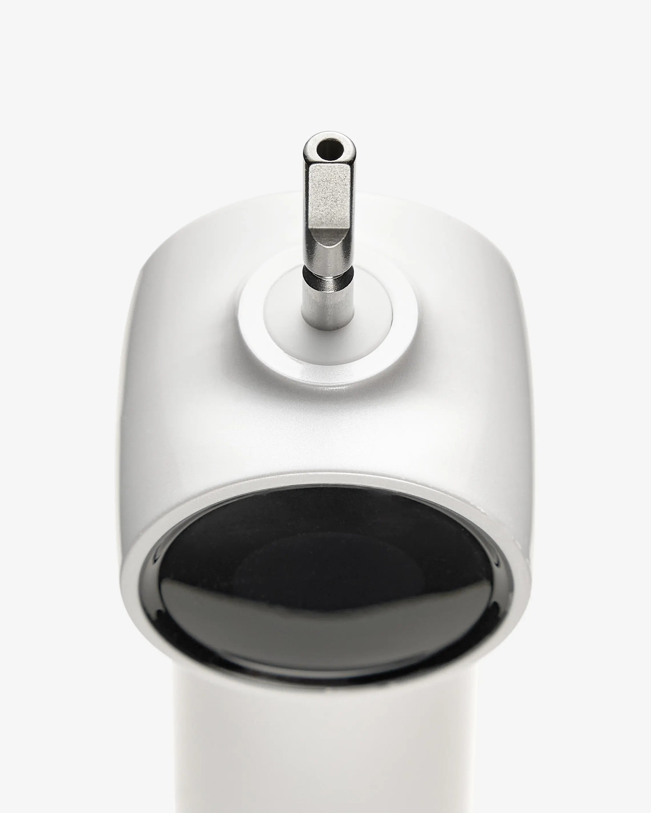 Close-up of the AirJet X5 electric toothbrush toothbrush with the brush head removed, showing the central airflow channel.